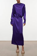 Purple silk midi dress with draped cowl neck, long batwing sleeves, and waist tie