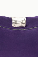 Purple cuff clutch with STAUD logo silver frame clasp