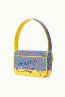 TOMMY beaded bag back view, yellow handle and border, blue and red phone motif.