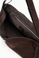 Espresso brown suede messenger bag interior with zip pocket and leather trim.
