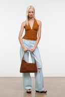 Tabac suede shoulder bag with adjustable strap and slouchy hobo silhouette