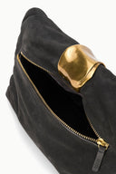 Dark mocha cuff clutch side view with gold zipper and interior pocket