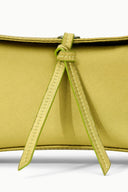 Lime green clutch bag top tie with double stitching and drawstring knot