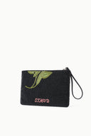 Black beaded pouch with green floral detail and pink 'STAUD' logo wrist strap