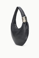 Black cuff bag with long handles and silver metallic cuff near the top opening