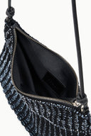 Asta shoulder bag with dark knit exterior and black lined interior pocket and zipper edge