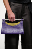 Carys croc-embossed purple clutch with bar handle and yellow interior top edge