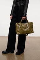 Croc-embossed olive satchel with curved top handles and stitched front panel