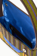 Beaded handbag interior with blue lining and zip pocket, multicolor striped exterior