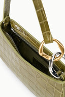 Olive croc-embossed shoulder bag interior with zip pocket and gold hardware
