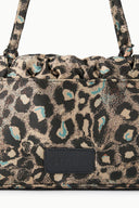 Elodie shoulder bag close-up with leopard pattern front patch logo