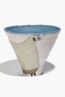 Wide ceramic sheep vase, white exterior with blue interior, sheep face patch in relief
