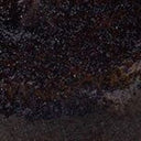 Textured dark ceramic surface detail