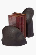 Natural stone rock bookends, one standing and one front, holding red books
