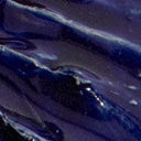 Textured indigo-glaze mirror surface close-up with glossy streaks