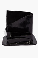 Glossy black wavy stationary holder with open curved insert and base tray