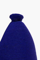Blue hand-beaded vase neck with tight woven bead pattern