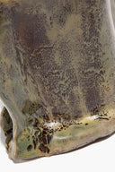 Ceramic vase close-up, mottled snake-skin glaze in olive, teal and dark brown