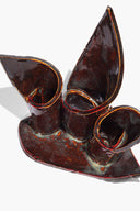 Ceramic triple candleholder, maroon wash glaze with three rounded candle openings and drip rim