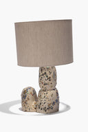 Ceramic table lamp with speckle-glaze base and beige fabric drum shade