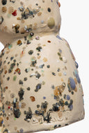 Speckle-glaze ceramic lamp body detail with colorful raised specks