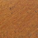 Mustard glaze ceramic surface texture close-up