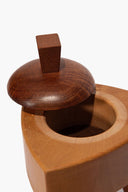 Wood trinket box lid with knob, showing circular interior opening on squared base.