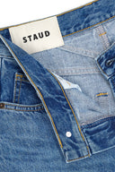 Relaxed vintage wash jeans with waistband label and stitched yoke detail