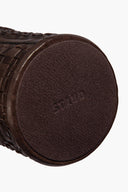 Espresso woven leather candle sleeve with embossed logo, circular base