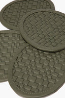 Moss woven leather coaster close-up with round stitched border and checker weave