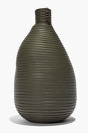 Moss wrapped vase, full view with tapered shape and stitched rings