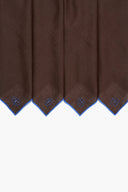 Set of linen napkins with blue-edged hems and small blue elephant icons