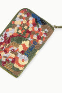 Beaded fruit zip wallet close-up, dark green border with red, blue, and white beads