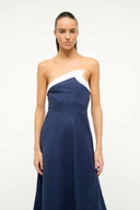 Navy strapless midi dress with white diagonal panel and asymmetrical hem