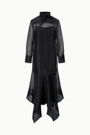 Black long-sleeve dress with bow neckline and asymmetrical sheer hem