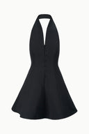 Black mini dress with deep V neckline and fitted bodice, flared skirt