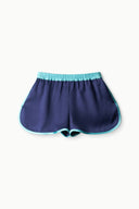 Dark navy shorts with teal elastic waistband and rounded turquoise-piped hem
