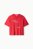 Red relaxed-fit tee with 'FEELING PRICKLY' chest graphic