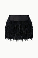 Black short skirt with feather-fringe overlay and wide waistband