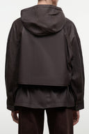Back of hooded leather jacket in dark brown, full zipper and stitched panels.