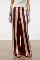 Silk wide-leg striped pants with burgundy and beige panels and blue side trim