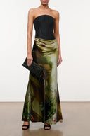 Strapless silk dress with black bodice and gold-olive patterned flowing skirt
