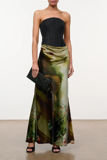 Strapless silk dress with black bodice and gold-olive patterned flowing skirt