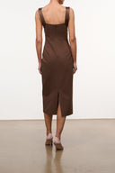 Brown sleeveless midi dress with straight back and center slit at hem
