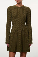 Olive cable-knit sweater dress close-up, textured cable pattern, long sleeves
