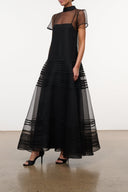 Black sheer-panel dress with cap sleeves and layered ruffle maxi skirt