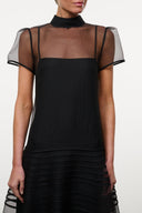 Black high-neck sheer overlay dress with cap sleeves and tiered trim