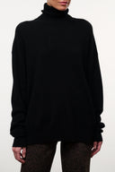 Black cashmere turtleneck sweater with ribbed collar and drop sleeves