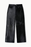 Black haircalf wide-leg pants with zip fly, belt loops, and front pockets