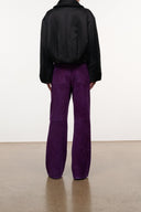 Gus suede pants in amethyst purple, back view with relaxed straight legs